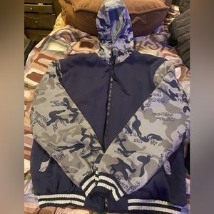 Men’s blue, gray and white zip up sweater